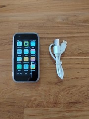 Mini Phone World’s Smallest 3.0″ HD Touch Screen Dual SLM 3G Bundle