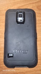 Samsung Galaxy S5 (SM-G900A) Black + 32GB SD Card + Otter Box + 2 Belt Clips