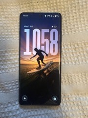 OnePlus CPH2523 Green Bar Smartphone with Circular Rear Camera Module