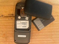 TWO working Nokia 2610 cell phone, power cord, and manual
