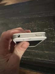 Apple iPhone 4 in white, model number A1349.