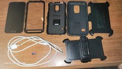 Samsung Galaxy S5 (SM-G900A) Black + 32GB SD Card + Otter Box + 2 Belt Clips