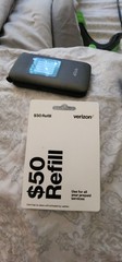 Verizon eTalk KAZ-F019 with $50 refill card. Flip phone, cell, cellular.