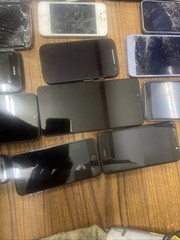 Lot of 31 smartphones – sold for parts or repair