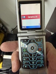 Motorola RAZR V3 Silver Flip Cell Phone Turns On When Plugged In. Read Desc. O