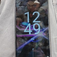 Silver Bar Smartphone with Geometric Pattern Back and Dual Camera