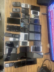 Lot of 31 smartphones – sold for parts or repair