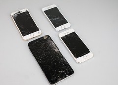 Lot of (4) iPhones A1633, A1522, A1533 – *FOR PARTS OR REPAIR*