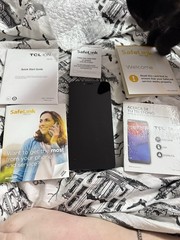 TCL SMARTPHONE. Works. Unsure of Use