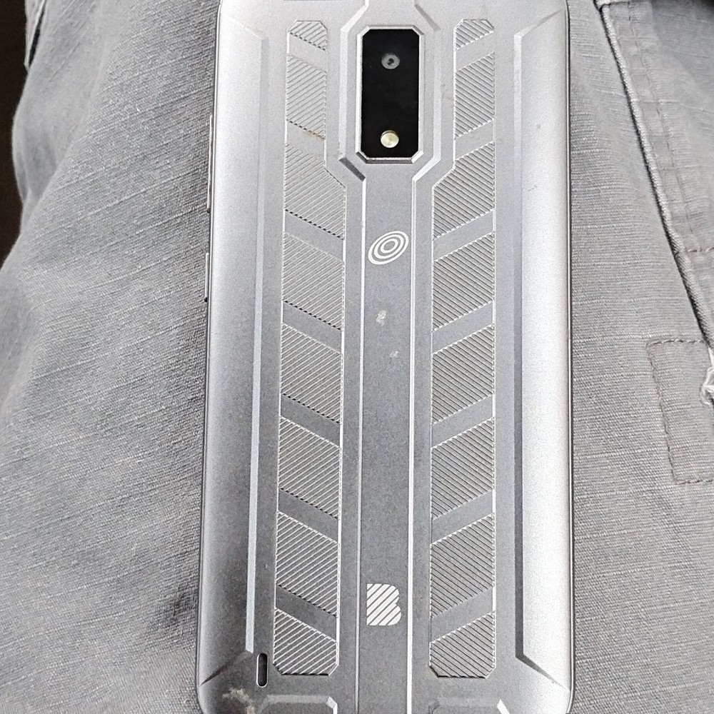 Silver Bar Smartphone with Geometric Pattern Back and Dual Camera