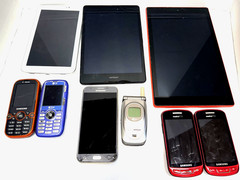 Lot Of 9 Old Phones And Devices Not Tested (for parts)