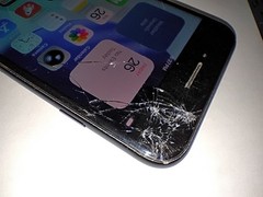 Lot of 2 Apple iPhone, 12 mini and SE 2020, both broken for parts or repair
