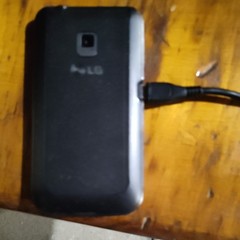 Tracphone LG 530G works perfect Cosmetic wear as expected from 2012. No box.