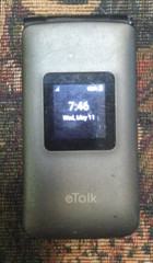 Verizon Wireless Freetel eTalk Prepaid Flip Phone (Gray) Gently seldom used.