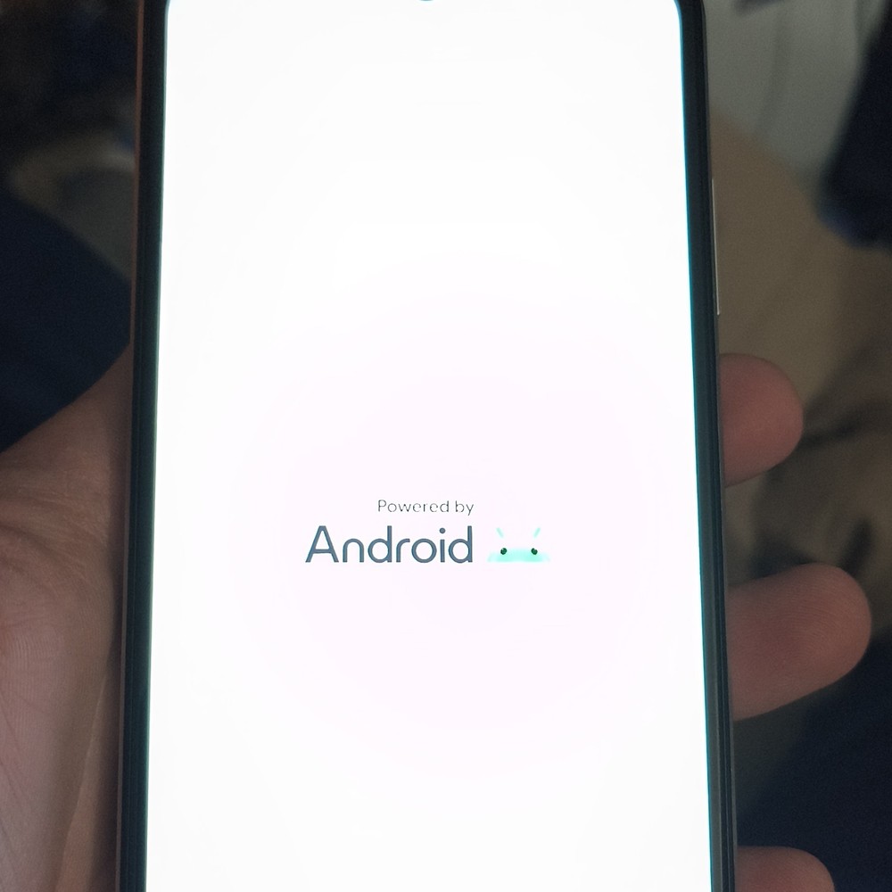Cricket Android Smartphone White Bar Style Dual Camera with Two Black Cases