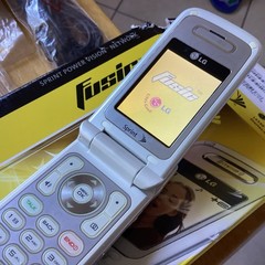 Vintage LG FUSIC – 23 MB Blue White Sprint Cellphone With Blue Tooth MP3 FM GPS