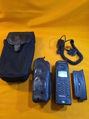 QUALCOMM GLOBALSTAR GSP-1600 HANDHELD TRI-MODE SATELLITE AND CELLULAR PHONE